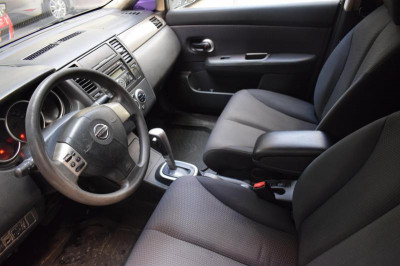 Nissan Tiida 1.6 AT (110 л. с.)